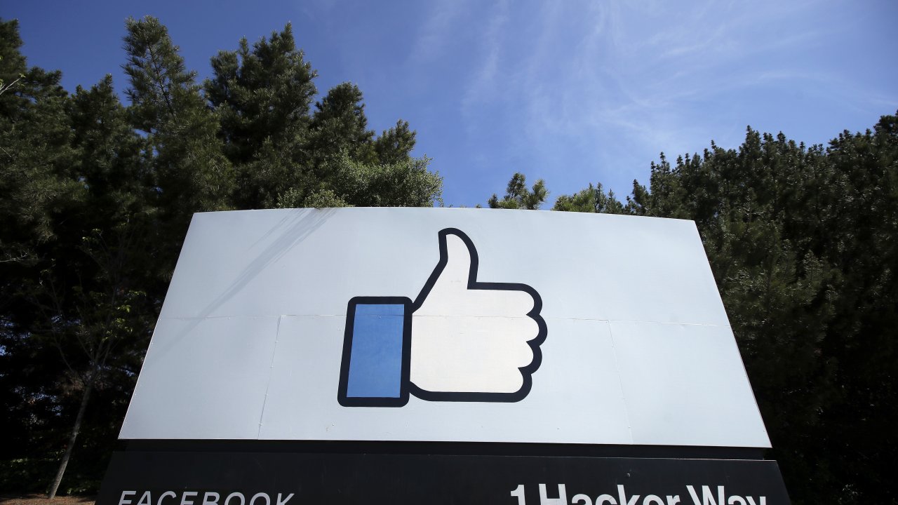the thumbs up Like logo is shown on a sign at Facebook headquarters in Menlo Park, Calif.