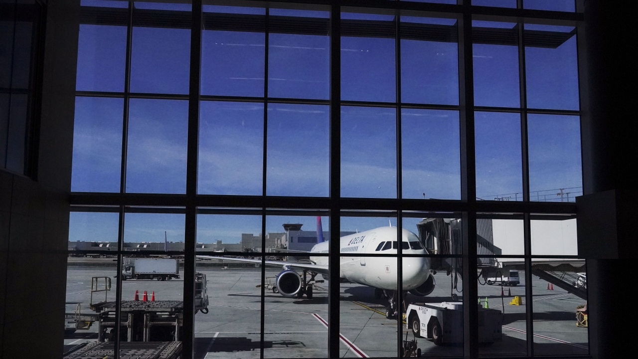 A plane prepares for a flight during holiday travel at Hartsfield-Jackson Altanta International Airport.