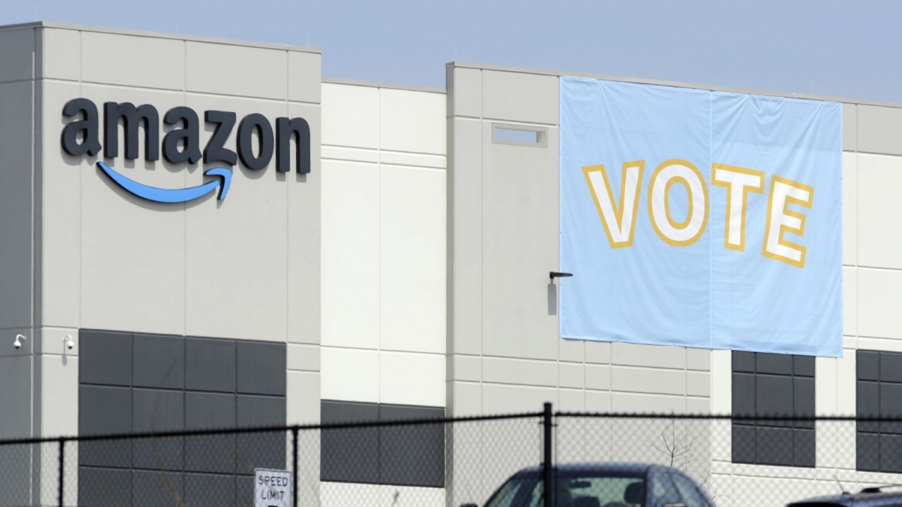 A vote banner is seen at an Amazon warehouse building in Bessemer, Ala.