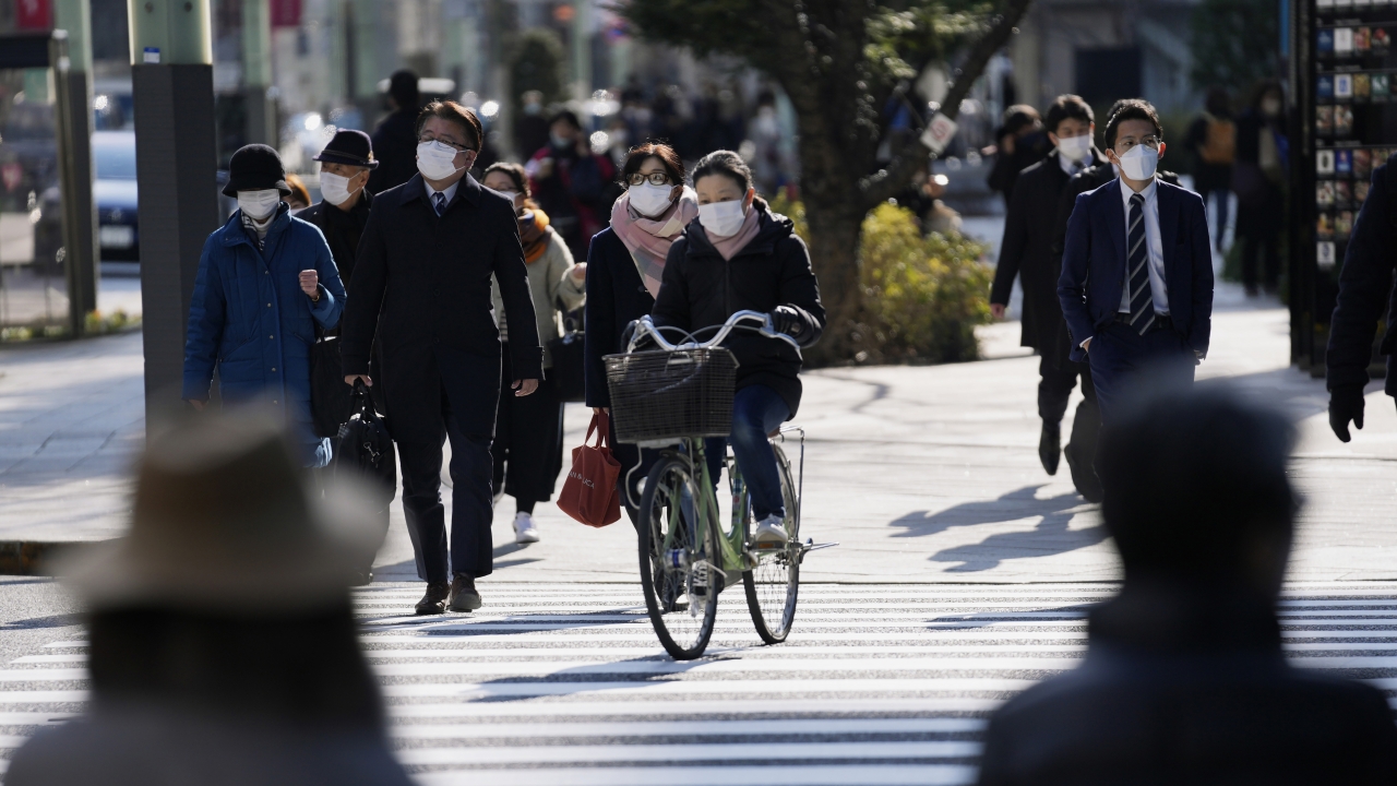 People wearing masks in Tokyo.