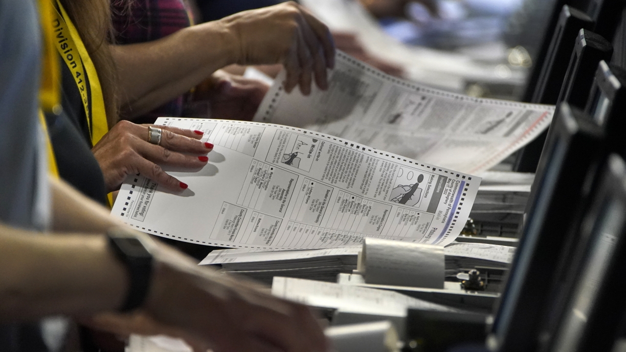 Election workers perform a recount of ballots from the recent Pennsylvania primary election