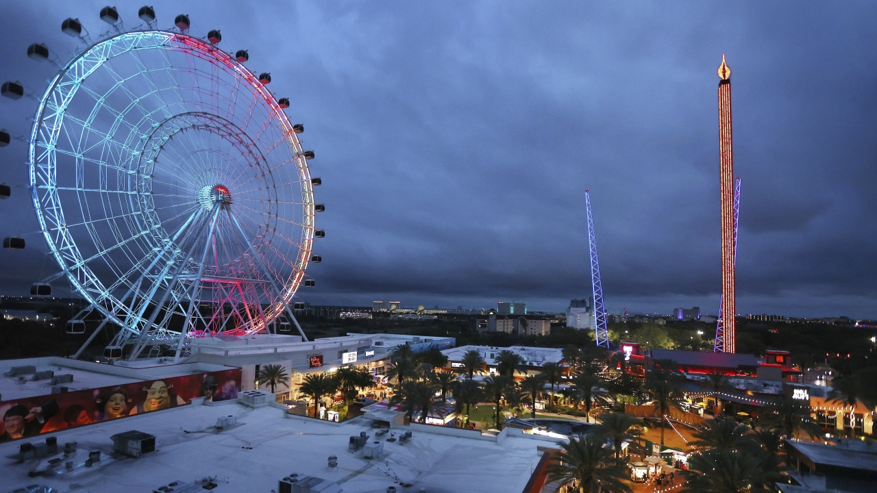 A ferris wheel and other attractions at Orlando's ICON Park