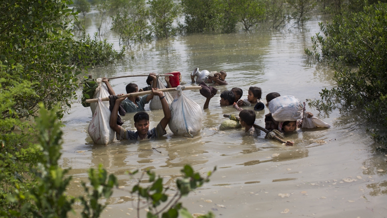 Rohingya family in waters near the Bangladesh border