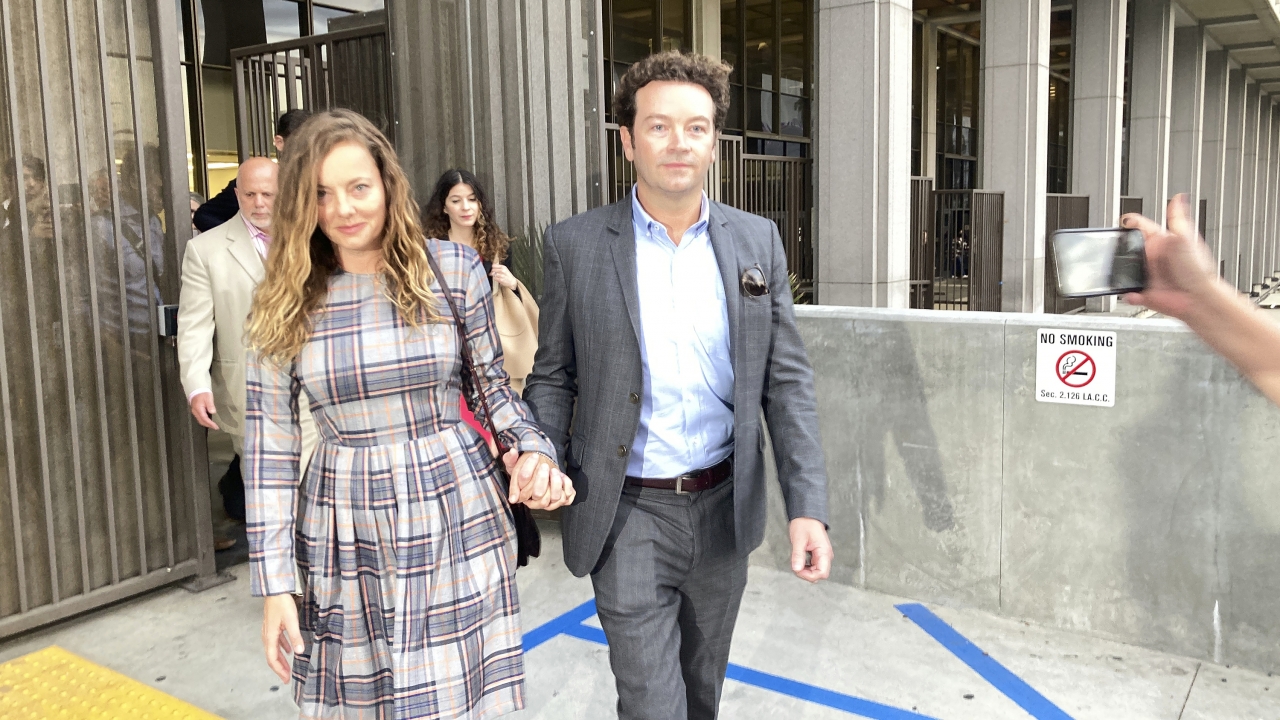 Actor Danny Masterson and his wife leaving court.